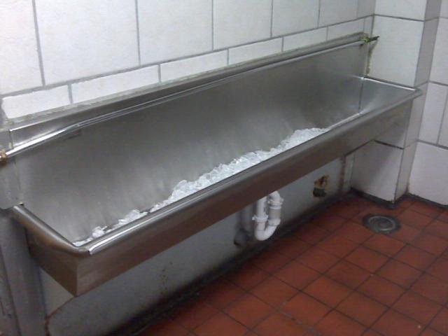 The mens bathroom underneath my local high school's football stadium  bleachers still uses vintage 1950's porcelain piss troughs :  r/mildlyinteresting